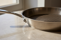 Poêle Inox Nid d'Abeille : Pourquoi 7 Plis Font La Différence (2026)