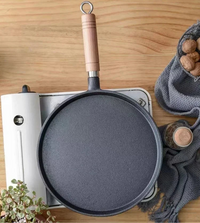 Poêle en fonte mi‑hauteur